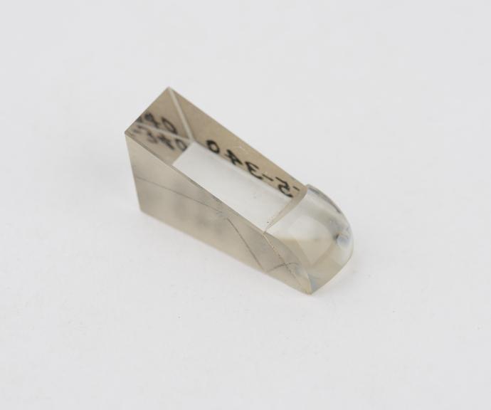 Small wedge-shaped glass prism with cemented plano-convex