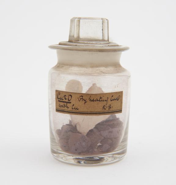 Cuprous oxide, produced by heating cupric oxide with copper
