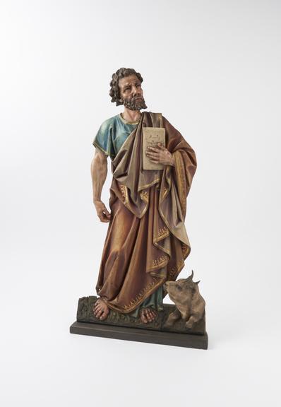 Carved relief figure of Saint Luke