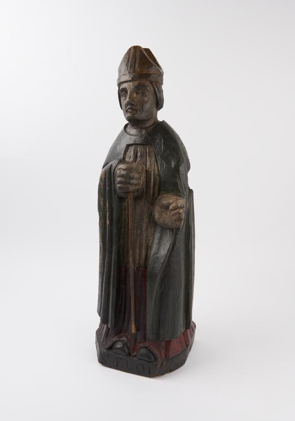 Wooden statue of Saint Eloi, patron saint of farmers