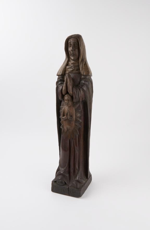 Carved wooden figure of St