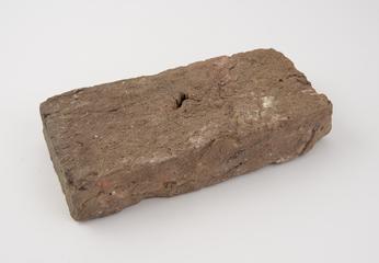 A brick from a 16th century wall (Mytongate excavation 1975)