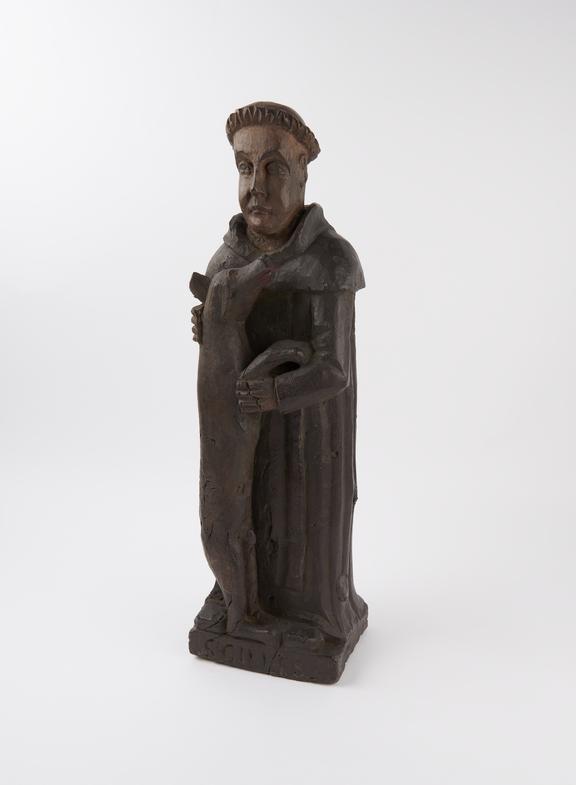 Wooden figure of Saint Giles, patron of cripples