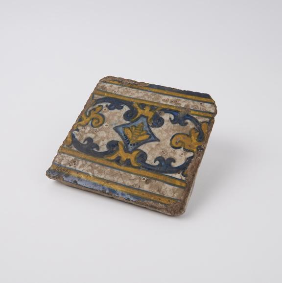 Earthenware tile, tin glazed and decorated in blue