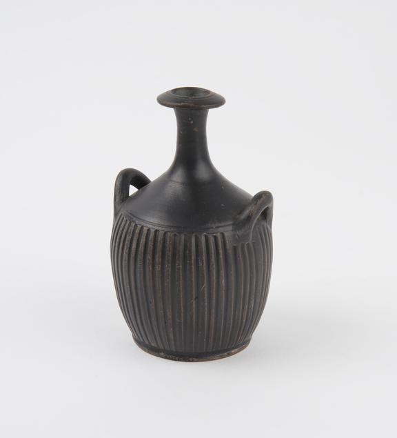 Small black glaze pottery jar, with narrow neck and two handles