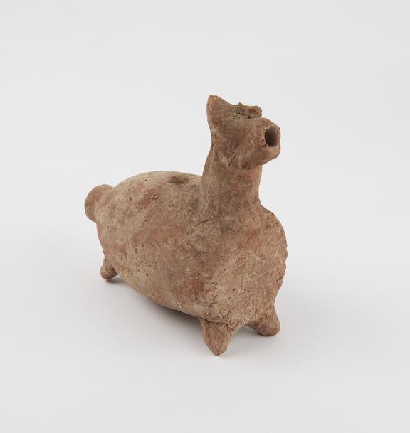 Oil bottle, in the shape of a mammalian quadruped, terracotta