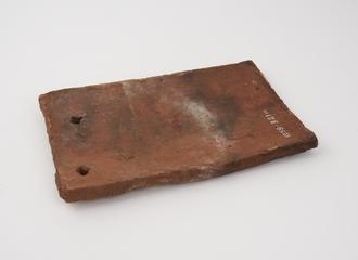 Ancient tile from the mediaeval barns at Temple Cressing