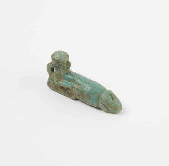 Green glazed faience pendant, amuletic