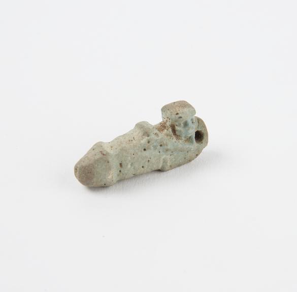 Small amuletic, blue faience pendant in form of phallic figure