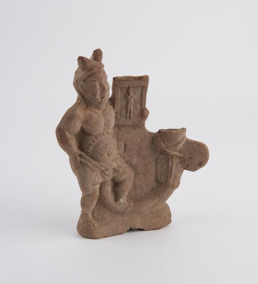 Hollow terracotta figure of gnome-like male with large phallus