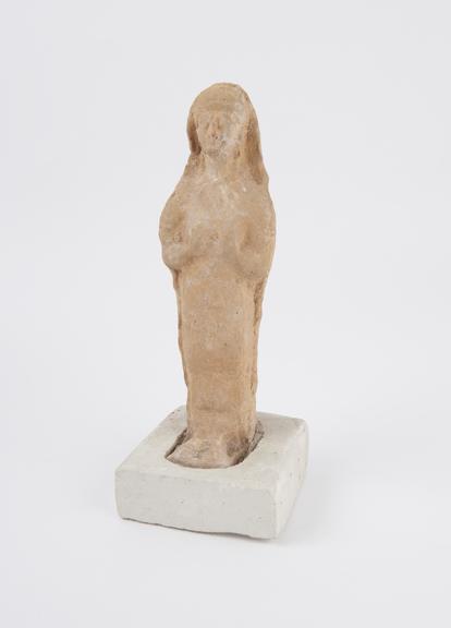 Statue, female, standing, terracotta, with plaster base, Cyprus