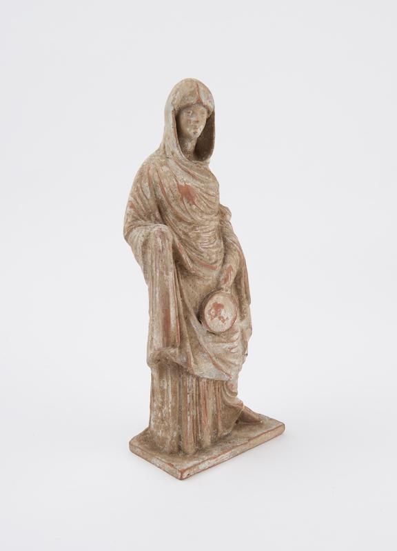 Statue, female, draped, carrying mirror, terracotta