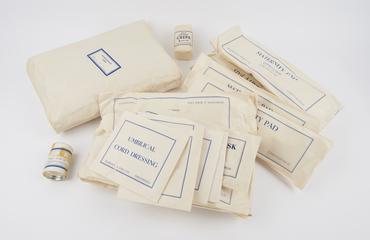 Sterilized maternity outfit, disposable pads, umbilical cord dressing kit