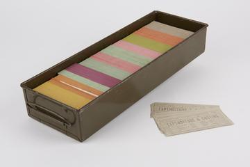 Half of a collection of 40 column punched cards in two trays