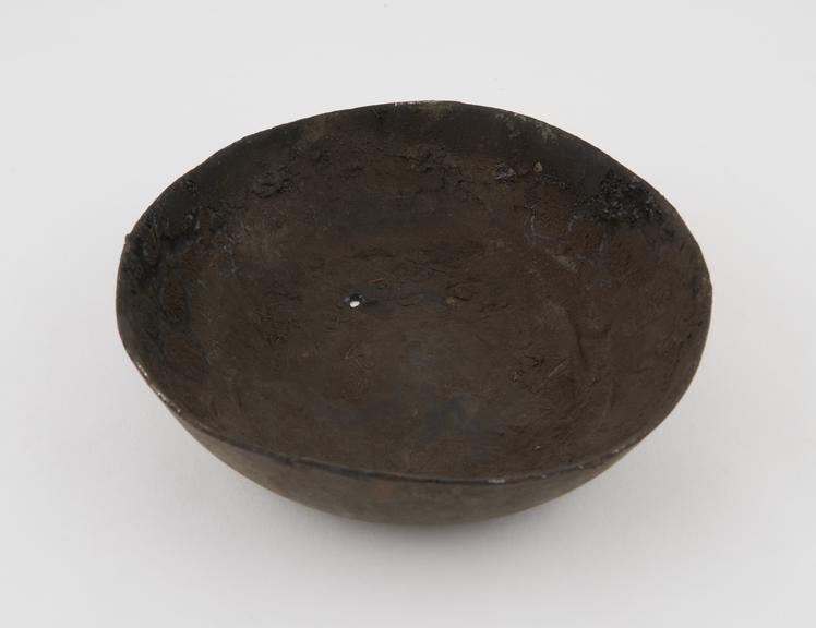 Metal bowl in poor condition, probably English, 1800-1900