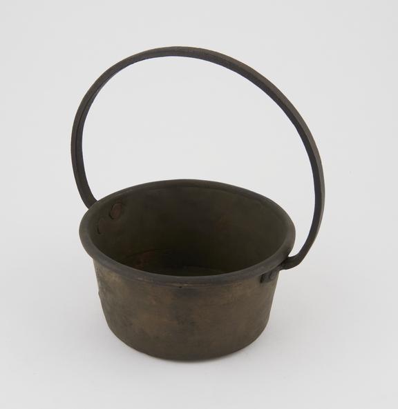 Brass pan with large looped handle, probably English, 1800-1900