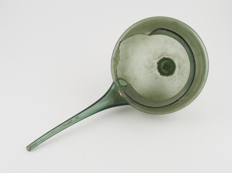 Green glass alembic, bell shaped head with neck and spout