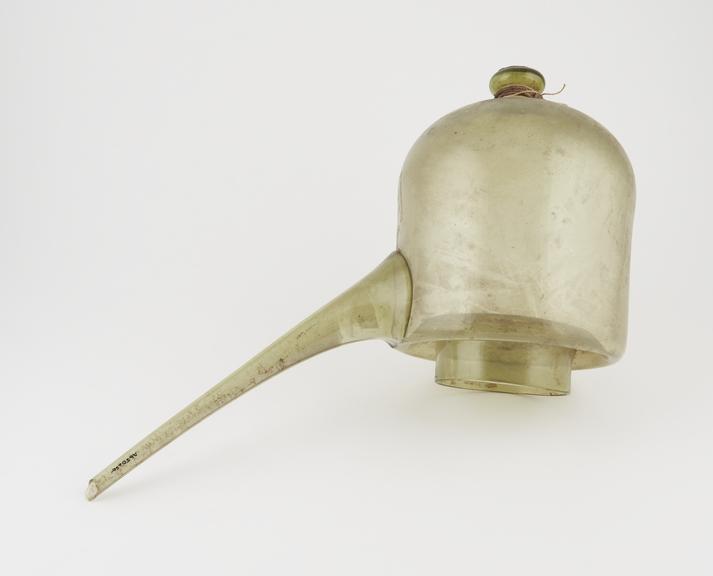 Pale green glass alembic, European, 19th century