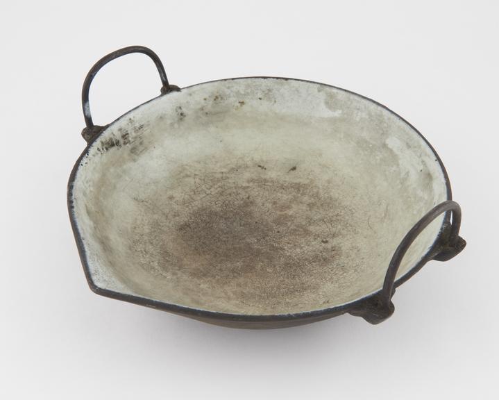 Iron pan, enamelled inside, two loop handles, inscribed on base