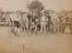 Men on their bicycles at the start of a race