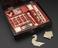 Chinese export laquered box of 10 ivory puzzles, made c. 1880