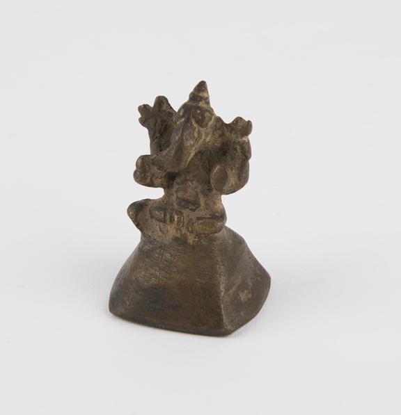 Small worn brass figurine of the hindu elephant-god Ganesh