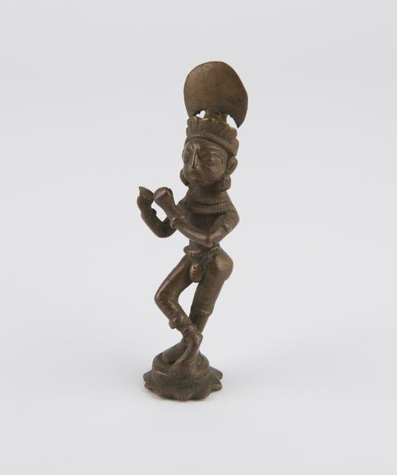 Figure of Krishna, brass, playing his flute to the Gopis, India