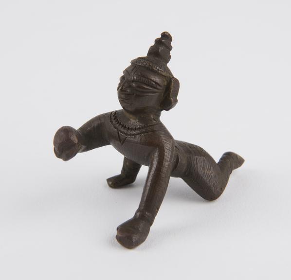 Statue of Krishna stealing butter, bronze, West India, 1801-1900