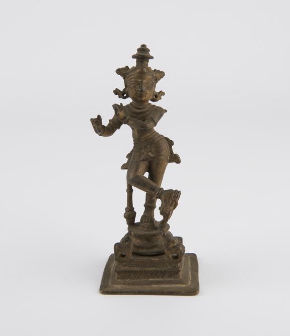 Statue of Krishna playing the flute, brass, South India