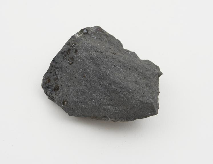 Ore-furnace slag, showing shots of regulus, Haford Works