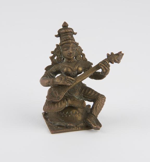 Statue of Saraswati playing the vina, brass, South India