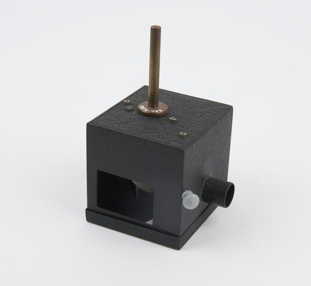 Flicker photometer mounted on short metal rod