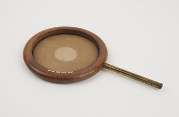 Card screen with `grease spot', in wooden ring on brass rod