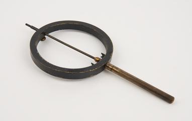 Lens or mirror holder, on metal rod (incomplete)
