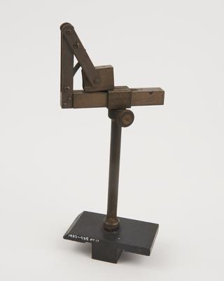 Sliding base to fit optical bench and support accessories