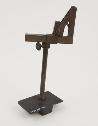 Sliding base to fit optical bench and support accessories