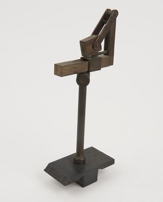 Sliding base to fit optical bench and support accessories