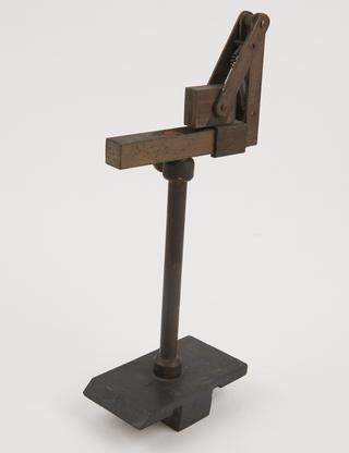 Sliding base to fit optical bench and support accessories