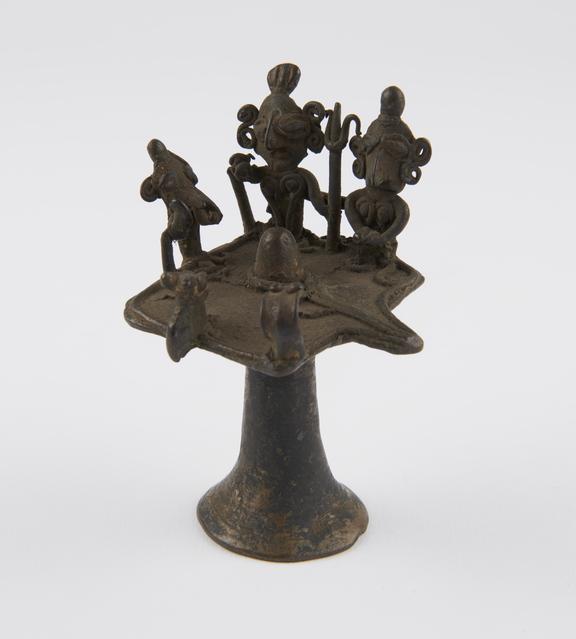 Brass lingam shrine with figures of hindu deities