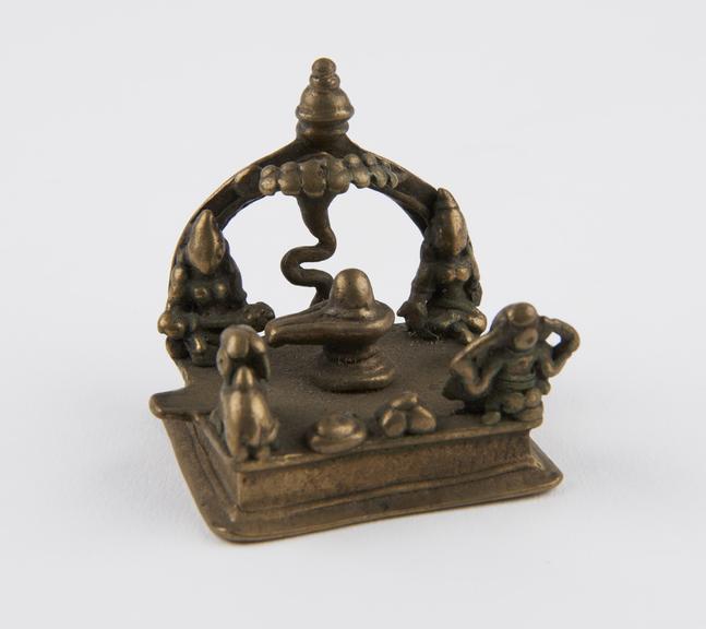 Shrine of lingam in yoni surrounded by deities, brass, Indian