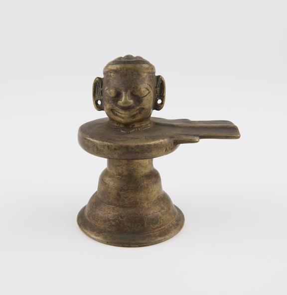 Brass lingam in form of the head of the hindu god Siva, Indian