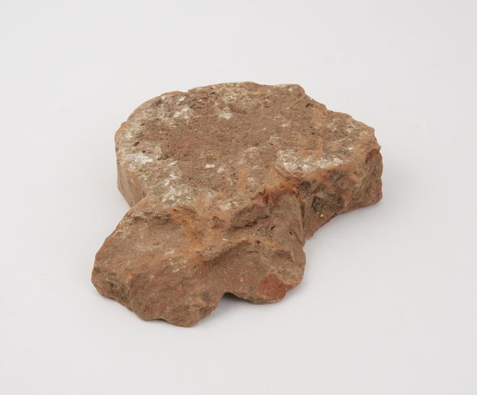 Shaped tile from Roman Villa