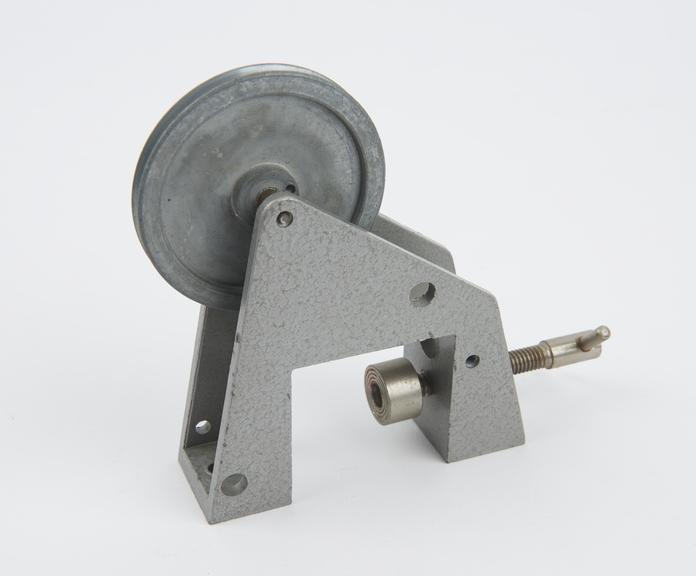 Pulley mounted in frame, for clamping to the edge of a bench