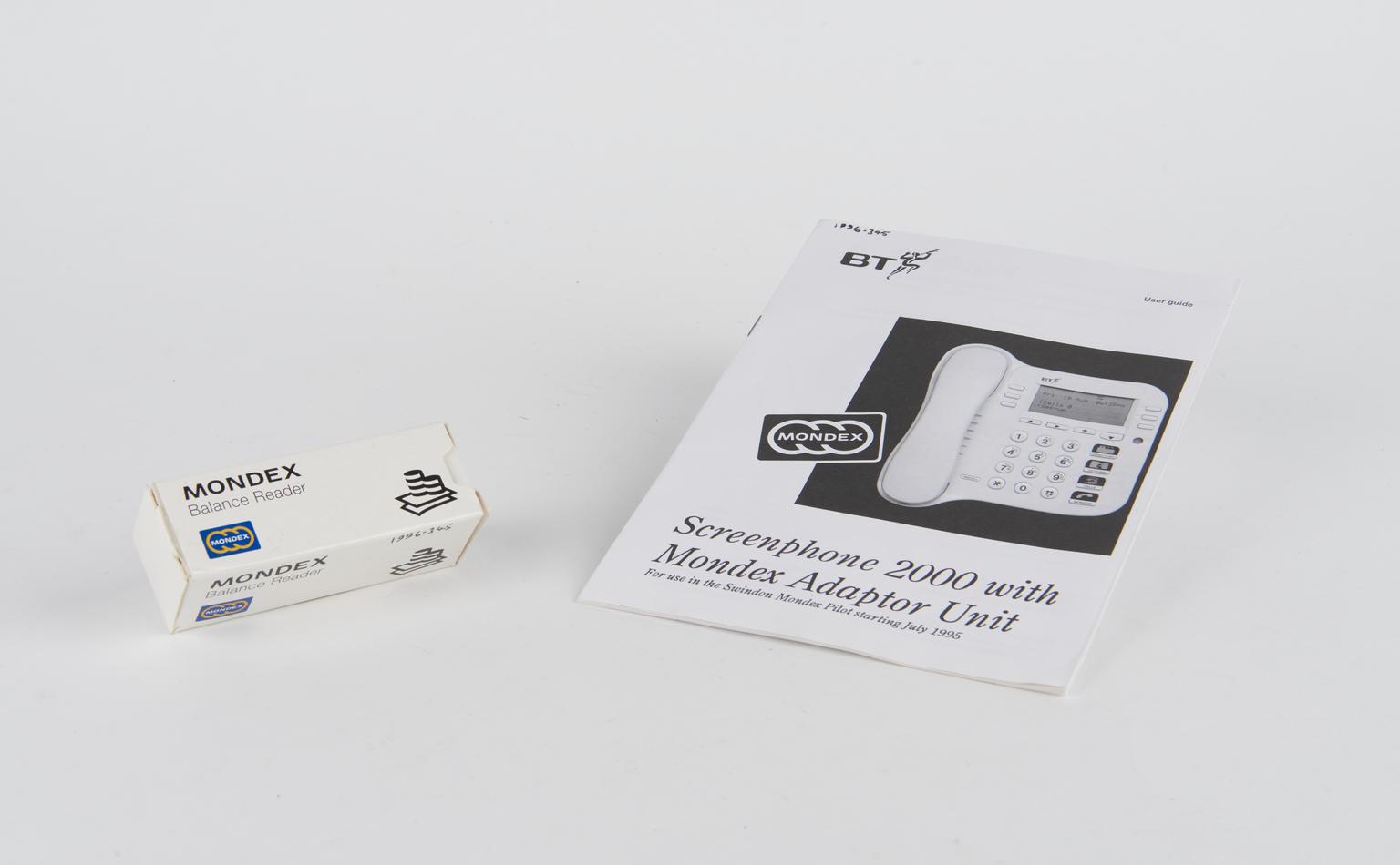 Original packaging and electrical adapter for the Mondex Electronic Cash System