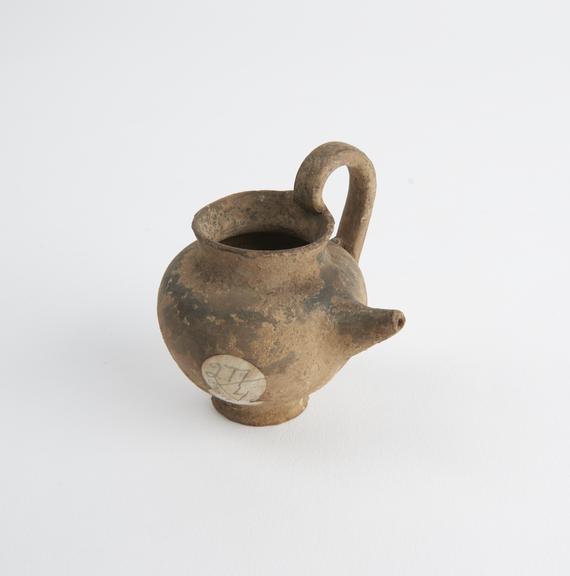 Earthenware feeding bottle or lamp filler, unsigned, Roman