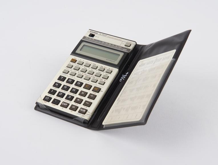 Electronic Pocket Calculator by Casio, model FX3500P, with case