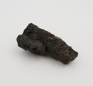 Piece of slag running out from the mass, called "Fox-tail"