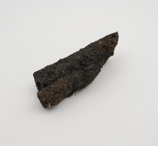 Piece of slag running out from the mass, called "Fox-tail"