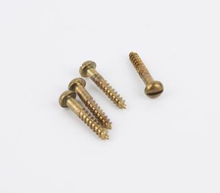 Four brass wood-screws for synchronous motor driven clock movement, England, 1940-1953