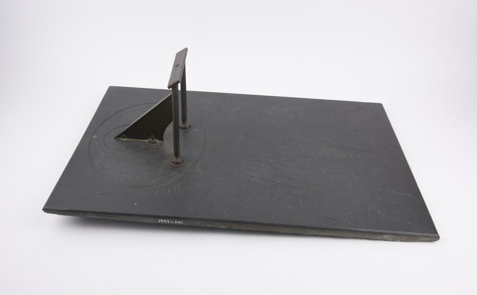 Horizontal sundial for latitude 43? with brass gnomon on slate